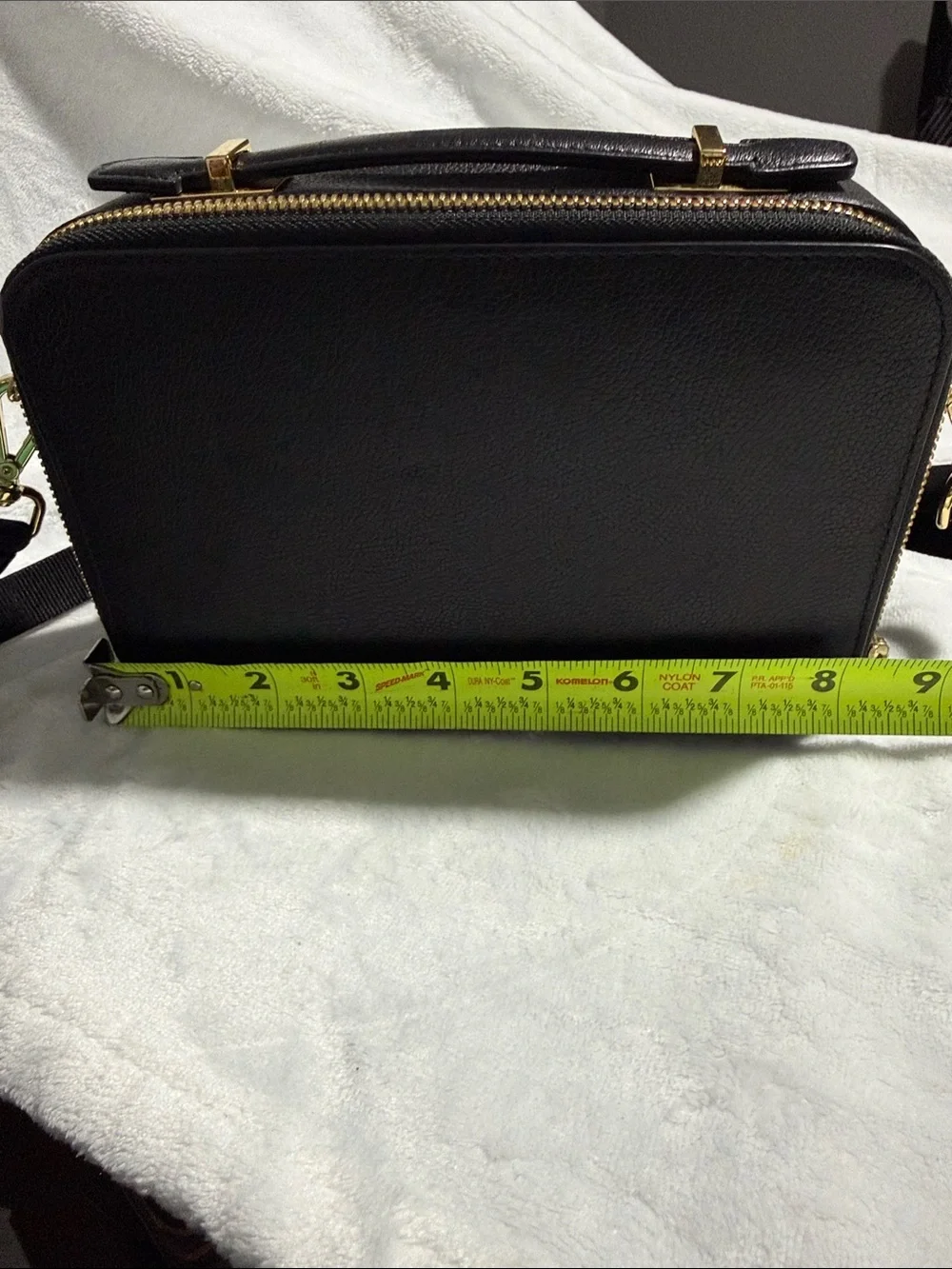 Tumi compact pebbled